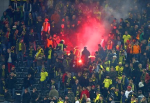Flares shot on Dortmund fans