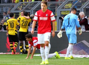 Großkreutz, Ramos and Mkhitaryan celebrating after the first goal