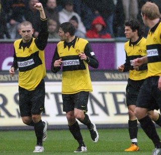 Mladen Petric celebrates his goal with Federico