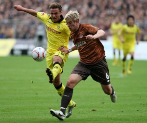 Mario Goetze against a player of Sankt Pauli