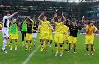 The team celebrating the victory