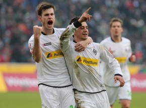 Nordtveit and Younes (r.) celebrate the 1-1