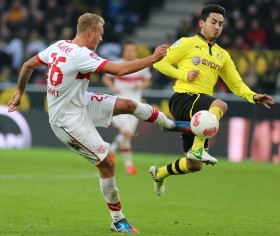 Ilkay Gündogan im Zweikampf