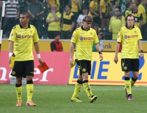 Zidan, Schmelzer and Grosskreutz after the match in MG