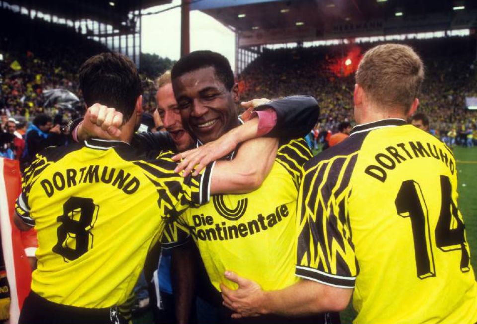 Spielzeit 1994/95 - Extase: Julio Cesar, Michael Zorc und Martin Kree im Meisterjubel